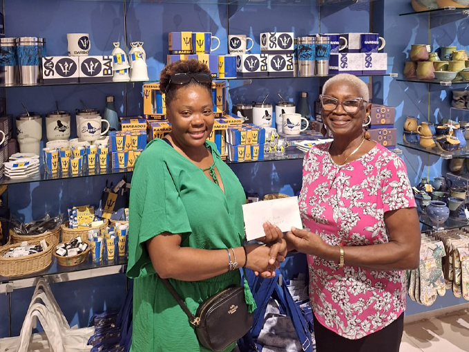 Member-Presenting-a-check